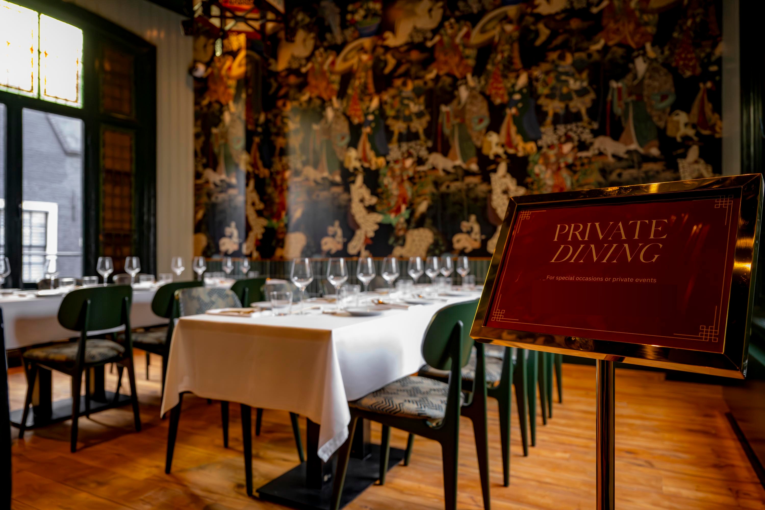 The private dining room at Lucky Duck, table set for a group